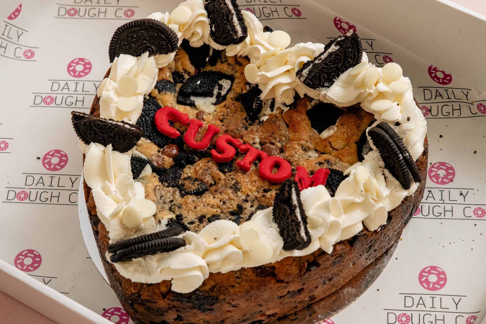 Loaded cookies and cream cookie cake